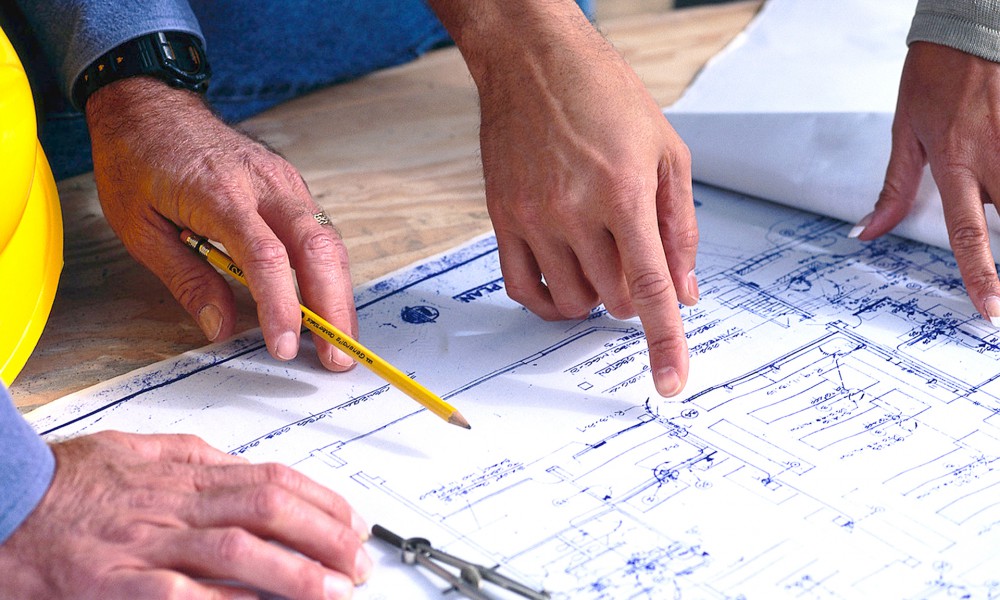 Hands Pointing at Blueprint Hands Pointing at Blueprint